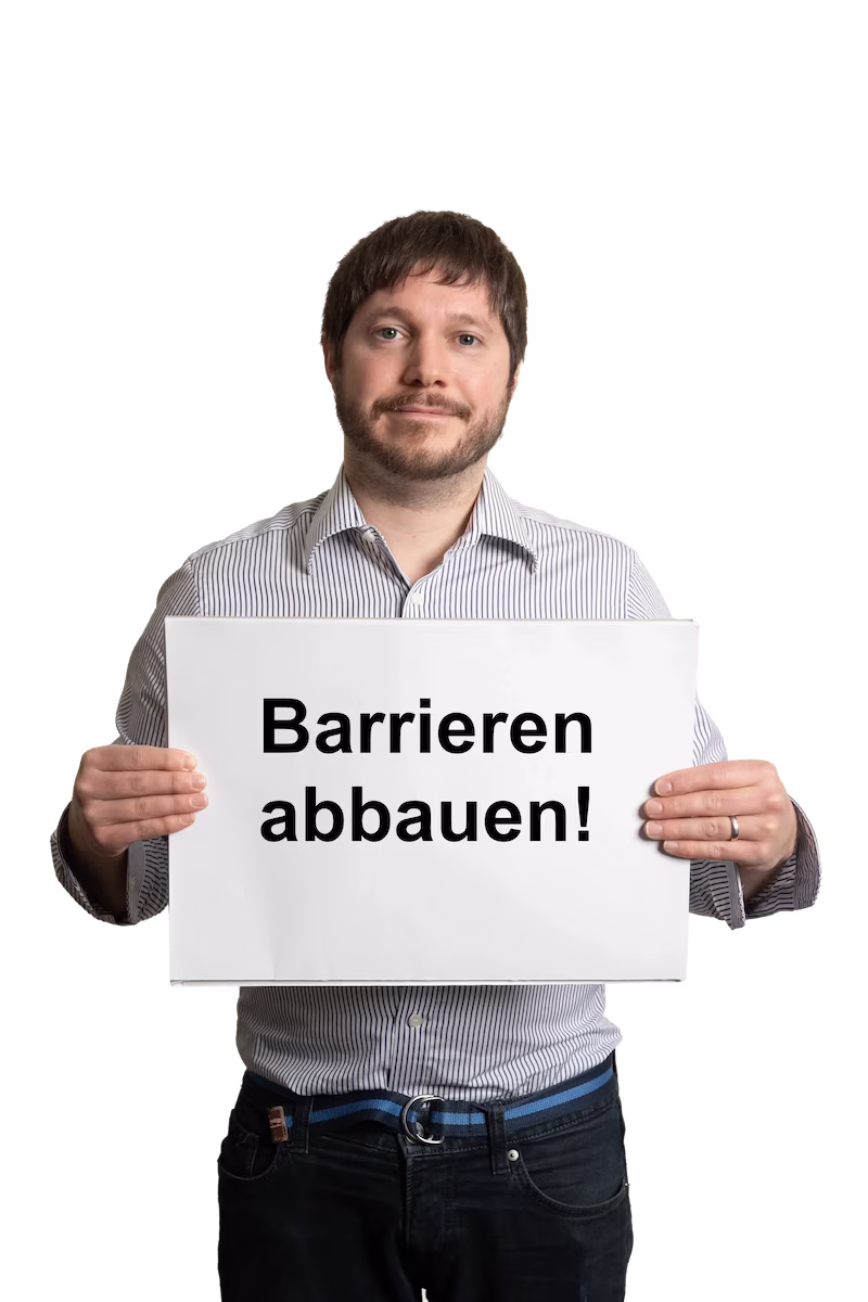 Timo wessels mitzettel in der hand darauf steht ladezeit barrieren abbbauen